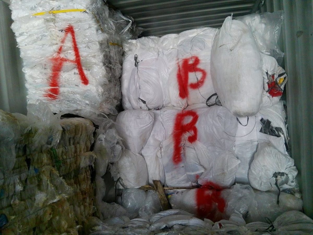 LDPE film bales grade-marked A and B, loaded in a container