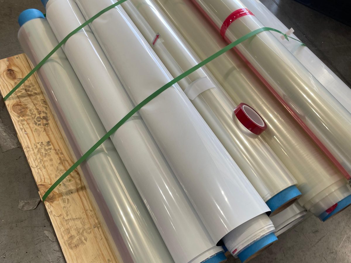 Leftover clear film rolls strapped to a pallet
